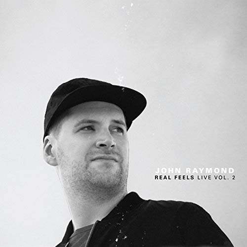 Black and white album cover featuring a man wearing a baseball cap.