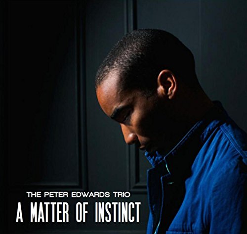 CD cover featuring a portrait of jazz musician Peter Edwards in blue.