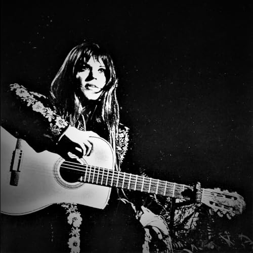 Black and white portrait of Melanie playing an acoustic guitar.