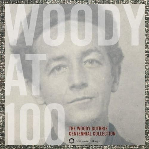 Woody Guthrie portrait on album cover with large white text.
