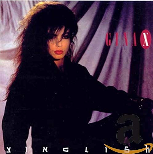 CD cover featuring Gina X with long dark hair and purple background.