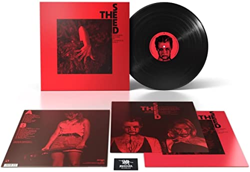 Red album cover and black vinyl record for "The Seed" soundtrack.