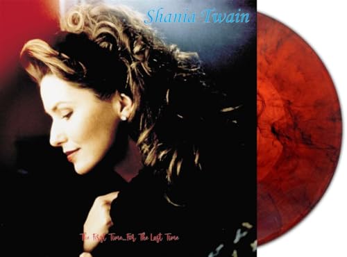 Shania Twain album cover with vinyl record beside it.