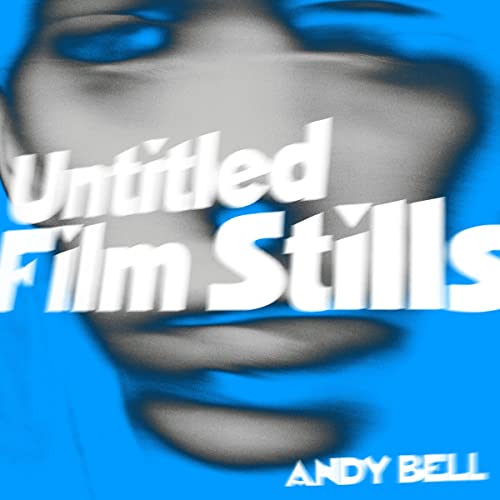 Blue album cover with blurred face and white text: "Untitled Film Stills".