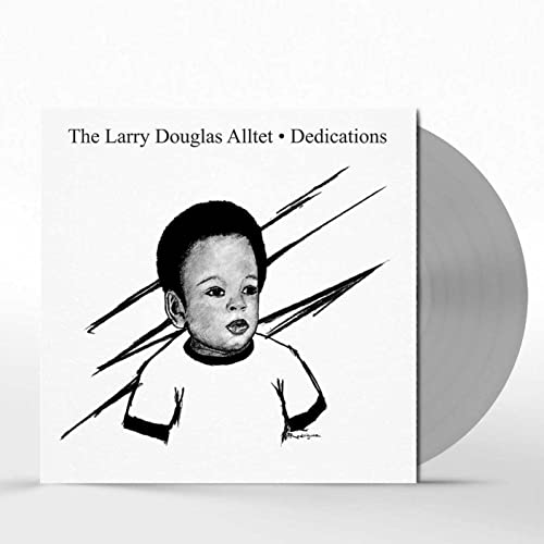 Vinyl record cover with portrait of a young boy and gray disc.
