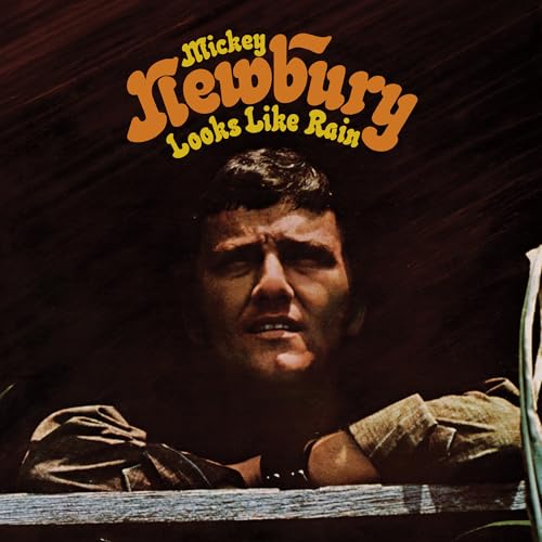 Album cover for Mickey Newbury’s “Looks Like Rain” featuring a portrait.