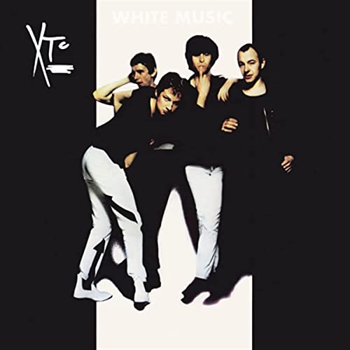 Album cover for XTC White Music featuring four band members against a white background.