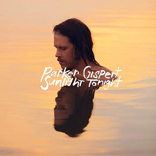 CD cover: man’s head and shoulders reflected in water, orange tones.