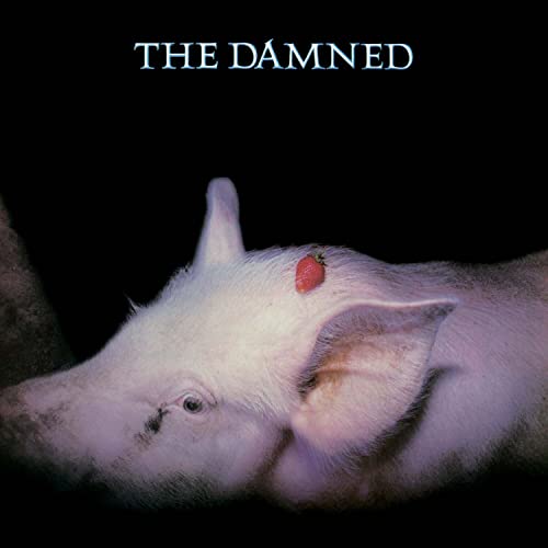 Album cover: a pink pig with a strawberry in its ear.