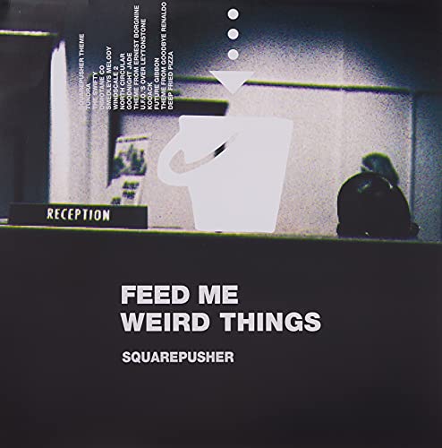 Squarepusher album cover: a white mug and text on a dark, grainy background.