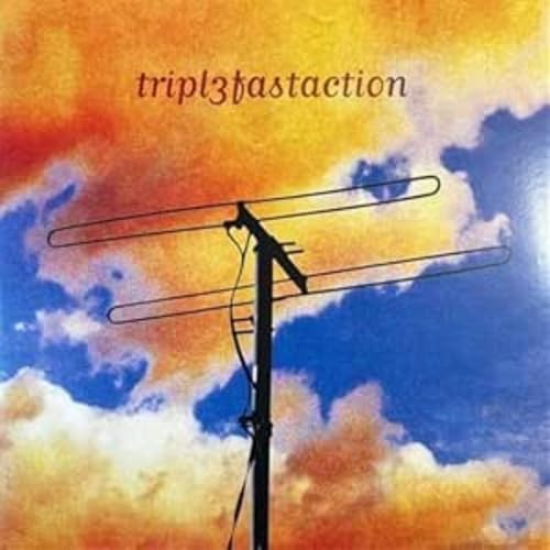 Vinyl record cover with a TV antenna against a colorful sky.