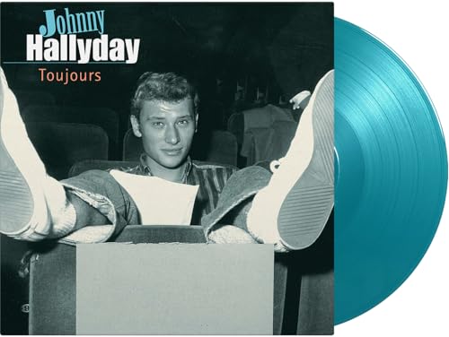 Johnny Hallyday “Toujours” vinyl record cover with artist portrait and blue disc.
