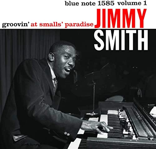 Jimmy Smith at an organ, album cover for “Groovin’ At Smalls’ Paradise.”