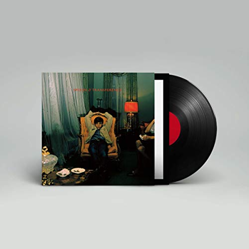 Vinyl record and album cover for Spoon's Transference showing a person in an armchair.