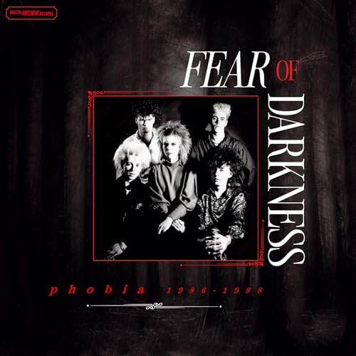 Album cover for “Fear of Darkness - Phobia” featuring a band portrait.