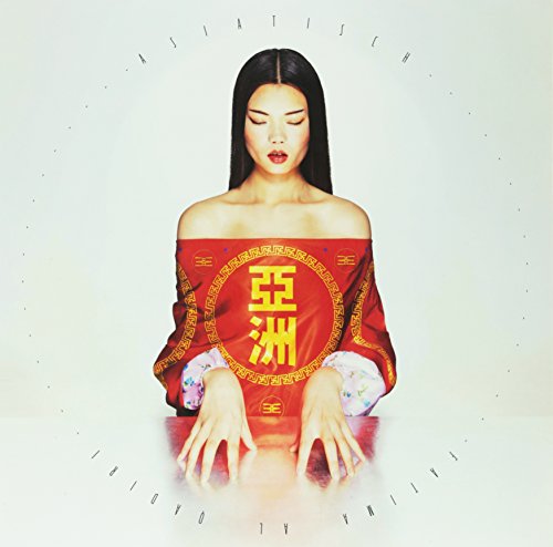 Vinyl album cover featuring a woman in red and gold traditional clothing.