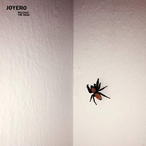 Vinyl record cover: textured gray background with a plastic spider.