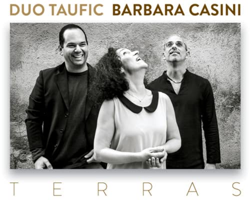Black and white photo of three people, CD cover for “Terras.”