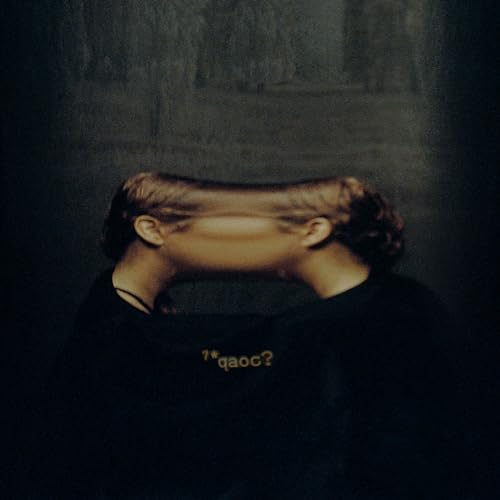 Vinyl album cover with a distorted, double-exposure portrait of a person.