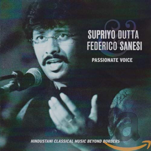 CD cover featuring a man singing into a microphone, text overlay.