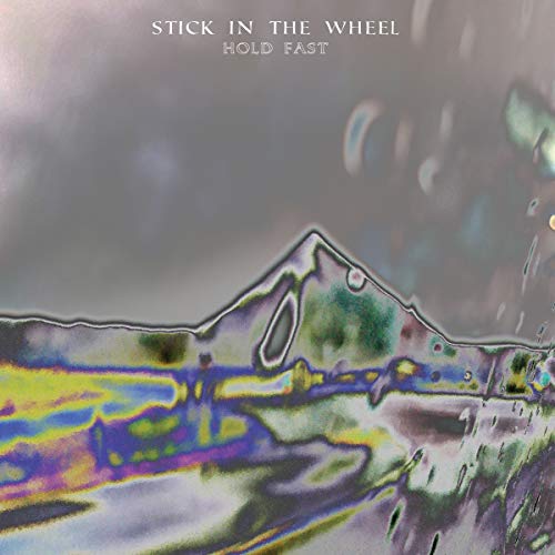 Album cover for “Stick In The Wheel - Hold Fast” with abstract landscape.