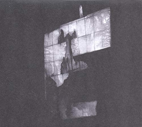 Black and white album cover with abstract architectural shapes.