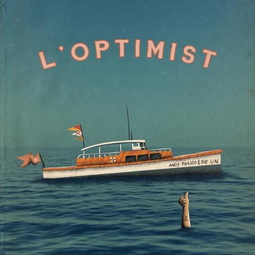 A boat floats on the ocean with a hand giving a thumbs up nearby.