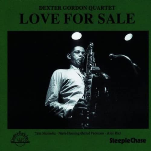 Dexter Gordon playing saxophone, album cover for “Love For Sale.”