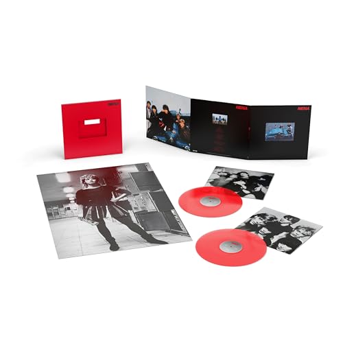 Nena vinyl record set with red records, black and red cover, and photos.
