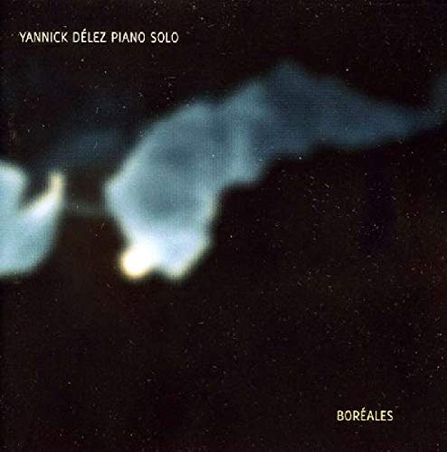 CD cover with abstract white shapes against a dark, speckled background.