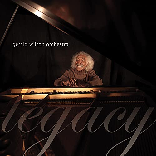 Gerald Wilson at a piano, album cover for "Legacy" CD.