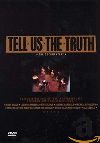 DVD cover for “Tell Us The Truth” concert documentary, dark background.