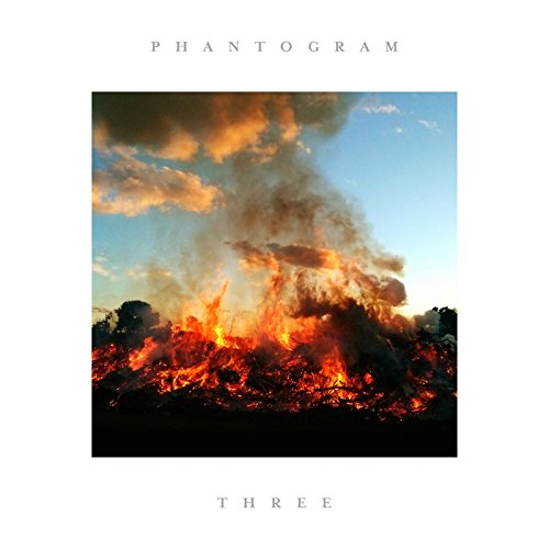 Album cover for Phantogram’s “Three” featuring a large, fiery blaze.