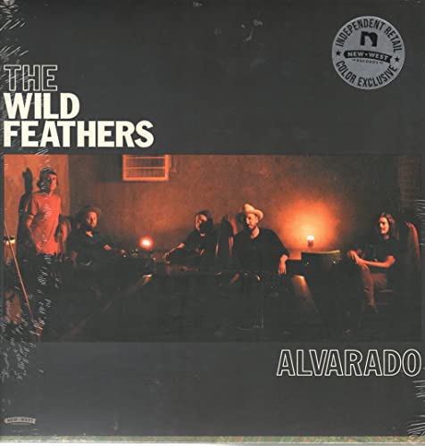 Vinyl album cover featuring The Wild Feathers, showing five band members in a dimly-lit room.