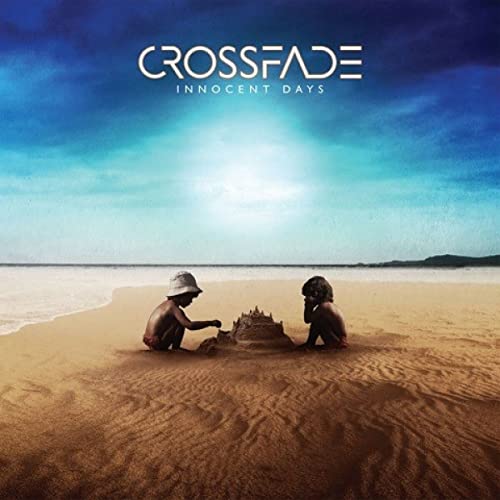 CD cover: children building a sandcastle on a beach under blue sky.