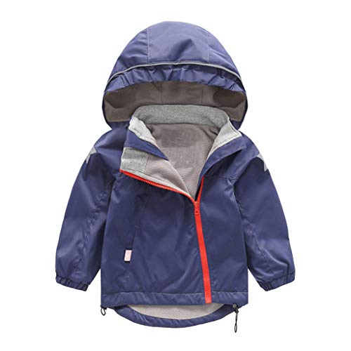 Navy blue children's raincoat with a hood and red zipper.