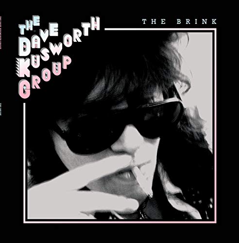 Vinyl record cover: black and white portrait of a man in sunglasses.