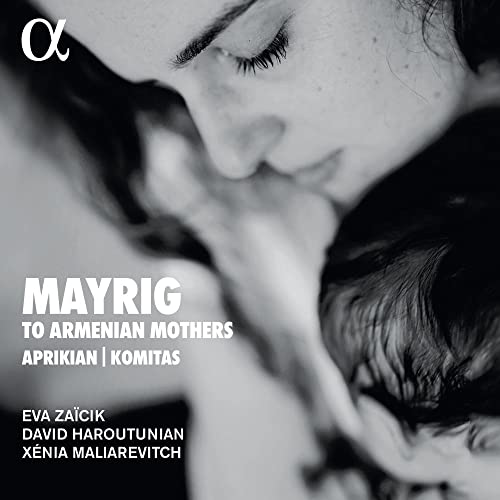 Close-up of a woman’s face with text “Mayrig. To Armenian Mothers.”
