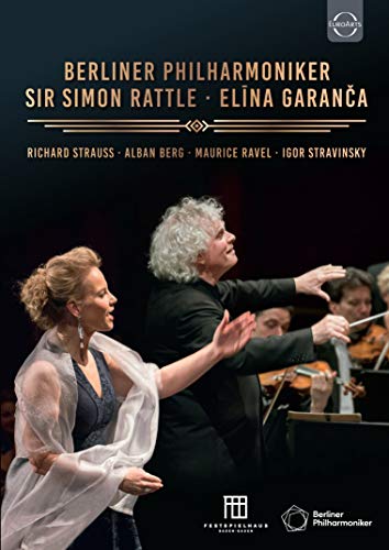 Orchestra conductor and soprano singer performing on stage, DVD cover.