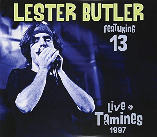 Lester Butler playing harmonica on stage, album cover for "Live in Tamines.