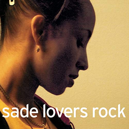 Close-up of Sade’s profile on the “Lovers Rock” CD cover, golden background.