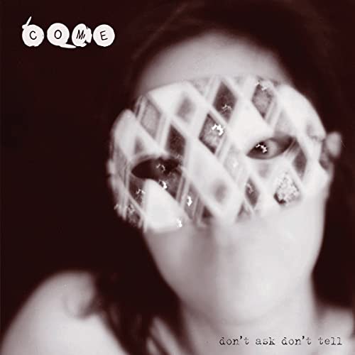 CD cover: face partially obscured by patterned tape, with text below.