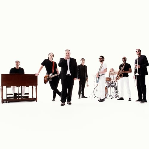 St. Paul & The Broken Bones band members in suits and black.