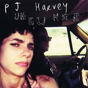 PJ Harvey album cover, "Uh Huh Her," featuring a woman’s face and car interior.