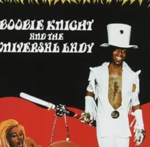 Vinyl album cover featuring a man in white with a top hat.
