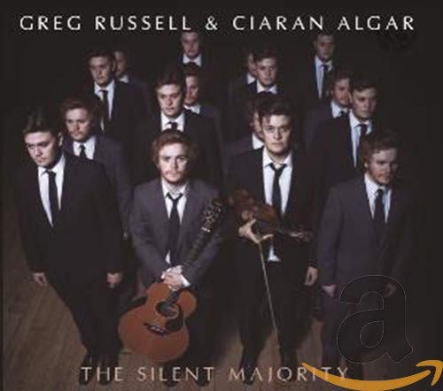 CD cover featuring a group of men in suits with guitars.