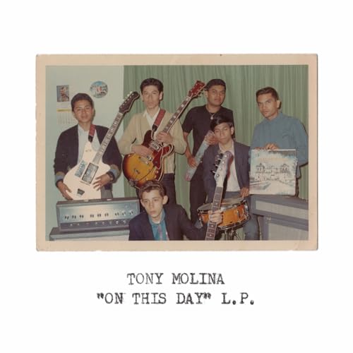Vintage photo of a band with guitars, drums, and the album title.