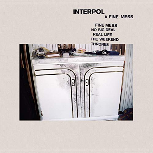 Interpol album cover, "A Fine Mess," featuring a cluttered dresser.