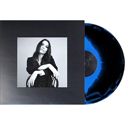 Vinyl record and album cover featuring a portrait of a woman.
