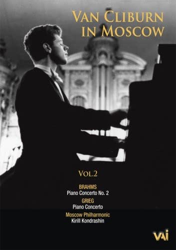 Van Cliburn at a piano, with a building in the background, DVD cover.